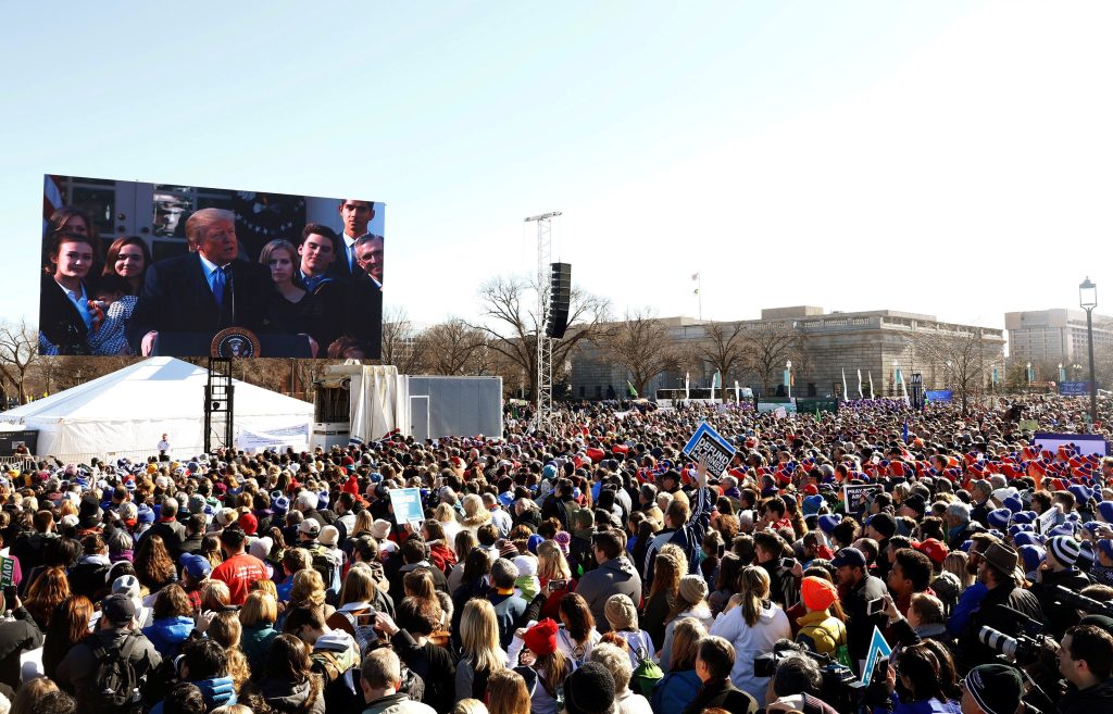 U.S. President Trump addresses the March for Life rally by satellite in Washington REFILE – CORRECTING DATE   U.S. President Donald Trump, speaking by satellite from the nearby White House, addresses attendees of the March for Life rally in Washington, U.S., January 19, 2018. REUTERS/Eric Thayer ERIC THAYER